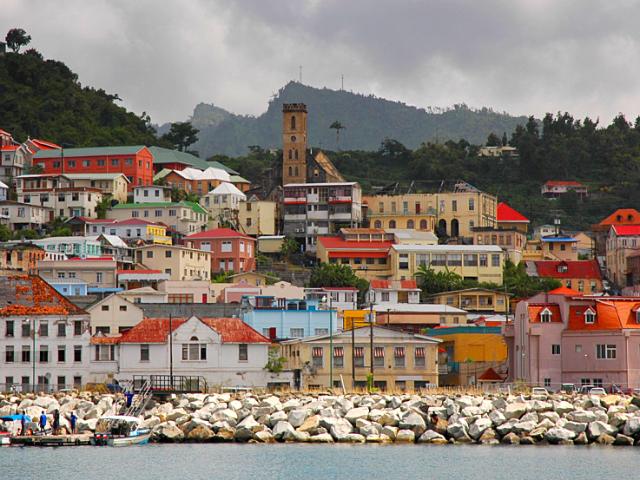 Take a Caribbean vacation to see colorful cityscapes on Grenada, the “Isle of Spice.”