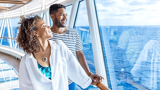 A couple enjoying an ocean view on a Princess ship.