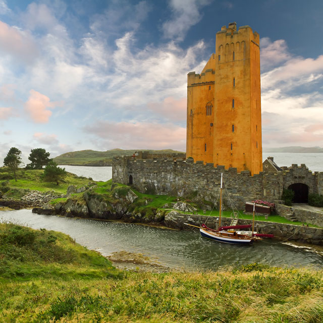 Boat next to castle in Cork, Ireland