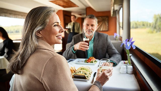 Train travelers dining on Alaska Princess rail 