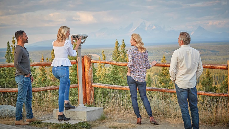 Guests enjoying scenic overlook at Copper River Princess Wilderness Lodge