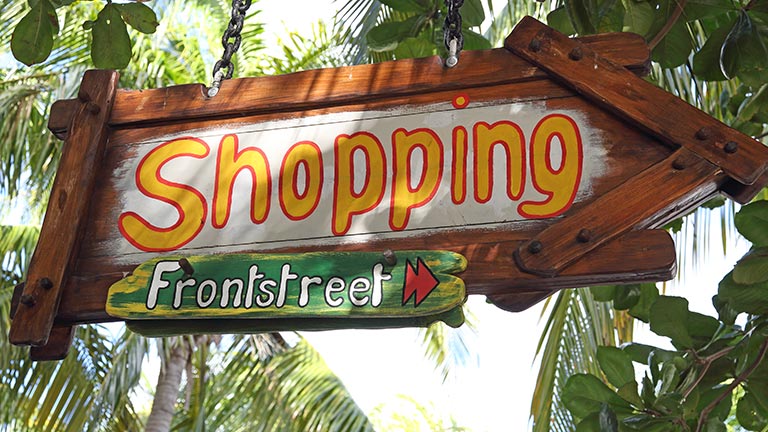 sign for shopping on front street