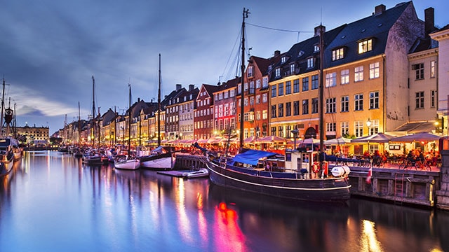 Sightseeing canal with boats docked on Scandinavian cruise