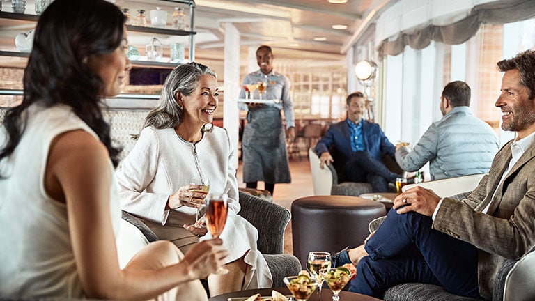 A group enjoying glasses of wine on Europe cruise