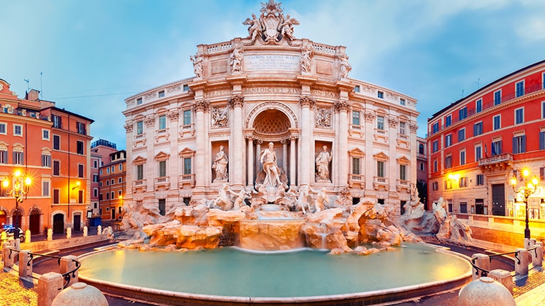 trevi fountain at dusk in Rome, Italy